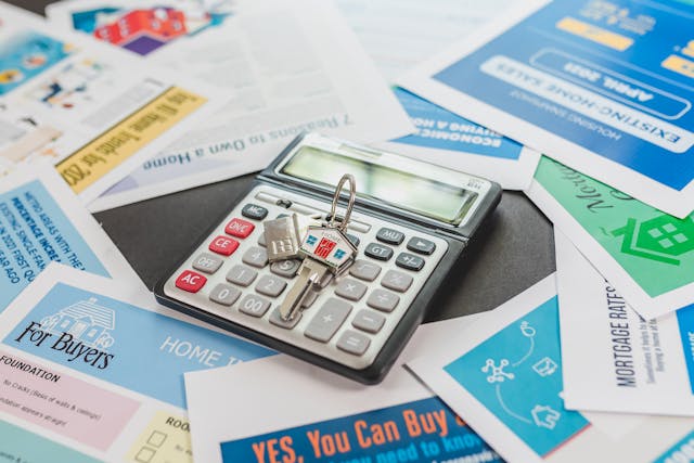 a%20bunch%20of%20housing%20documents%20surrounding%20a%20calculator a%20bunch%20of%20housing%20documents%20surrounding%20a%20calculator